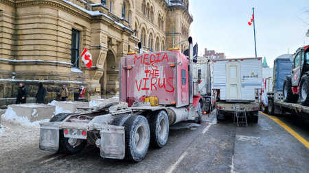 Freedom convoy 2022 in downtown Ottawa, Convoy of freedom. Canadian convoy protest against COVID-19 vaccine. No vaccine mandates Ottawa Ontario, Canada - February 1, 2022のeditorial素材