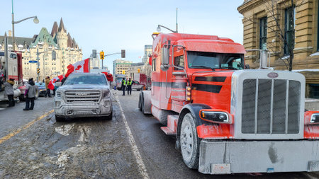 Freedom convoy 2022 in downtown Ottawa, Convoy of freedom. Canadian convoy protest against COVID-19 vaccine. No vaccine mandates Ottawa Ontario, Canada - February 1, 2022のeditorial素材