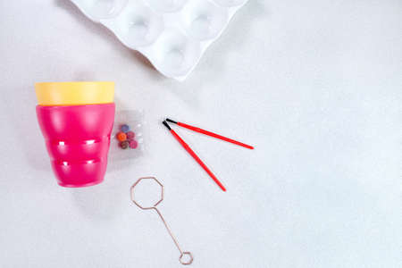 Close-up easter egg painting and decorating tools. Accessories for easter eggs painting. Space for textの写真素材