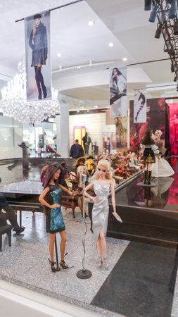 Barbie Expo display at downtown mall Les Cours Mont Royal, fashion stylish clothes of history. Fashion show runway and audience, photographer. Barbie doll exposition. Montreal, QC Canada - 10.22.2022.のeditorial素材