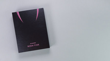 BlackPink BORN PINK 2nd Album Box set on grey background. Pink music CD. South Korean girl group BlackPink. Space for text. Gatineau, QC Canada - November 10 2022.のeditorial素材