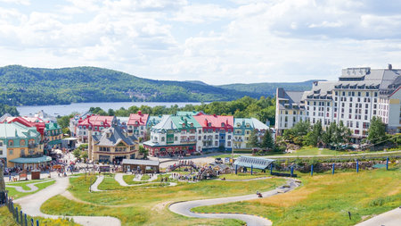 Sightseeing views colorful hotels at Mont Tremblant ski Resort in summer. Ski resort village view from funicular cabin. Mont-Tremblant, Quebec, Canada - 22.09.2022.のeditorial素材