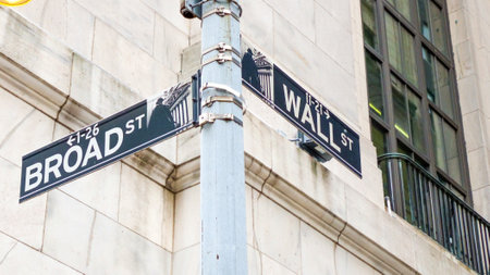 Road sign of New York Wall street corner Broad street.のeditorial素材