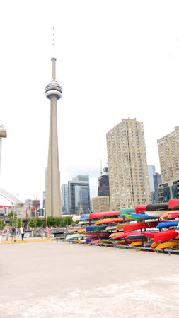 Downtown Toronto cityscape with the iconic CN Tower dominating the skyline. TORONTO, ON Canada - July 4, 2022.のeditorial素材