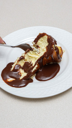 Delicious and Indulgent San Sebastian Cheesecake with Rich Chocolate ganache Topping for Dessert Lovers.の写真素材