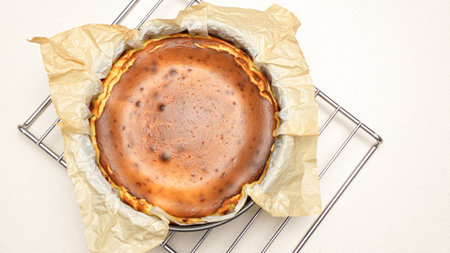 Delicious Homemade Cheesecake With caramel Crust And Creamy Filling Baked To Perfection.