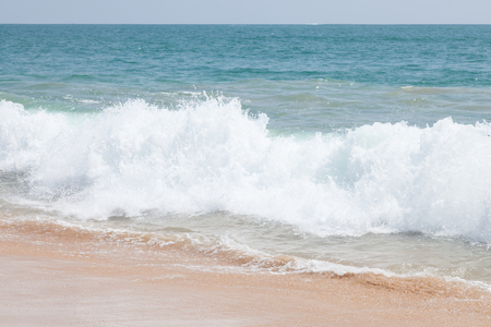Waves crashing at the beach in Hikkaduwa, Sri Lanka. No people or boats visible.の写真素材