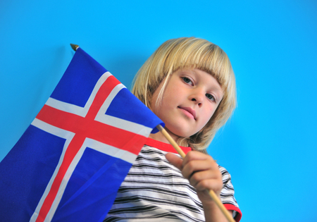 Portrait of a boy with national flag of Icelandの写真素材