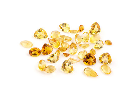 Group of citrine gemstones on white 