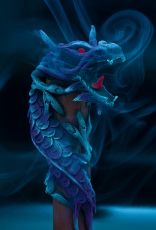Insence stick inside wooden dragonの写真素材