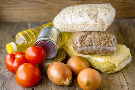 Stock of various products on a wooden background.の写真素材