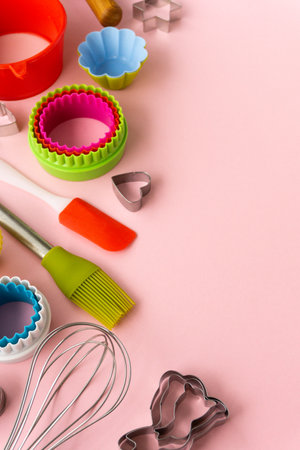 Set of various baking utensils on pink background.の写真素材
