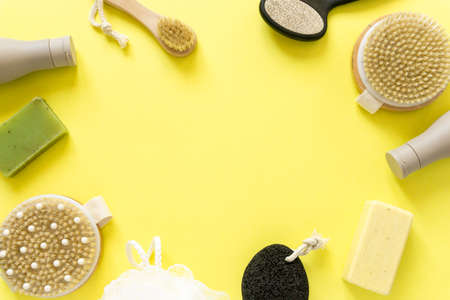 Frame of various items and products for bathroom on yellow background, copyspaceの写真素材
