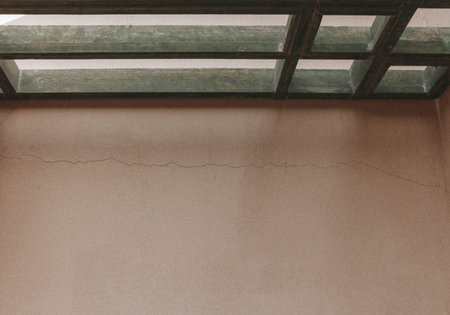 Summer sunlight and shadows. Minimal boho style. Wooden beams on the building in the Arabian style.