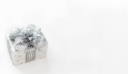 Gift box is isolated on a white background with copy space. The atmosphere of Christmas and New...