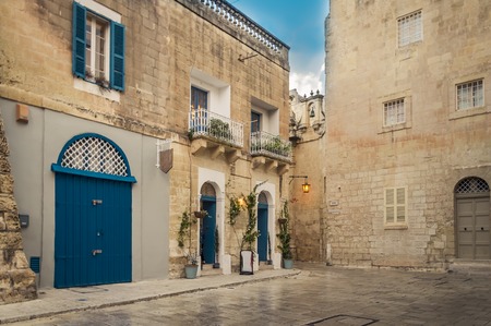 Mdina, Malta: Pjazza San Publiju. St Publius Square with traditional picturesque limestone townhouse. Medieval Maltese architectureの写真素材