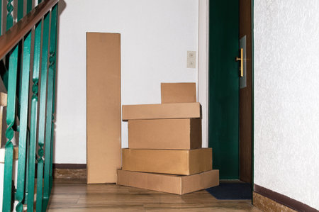 Stack of delivered packages in front of a door. Concept of goods delivery in lock down or quarantine...