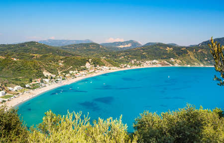 Porto Timoni beach on Corfu island in Greece. Beautiful panoramic view of green mountains, clear sea water, secluded Pirates bay and double stony beach. Famous destination for summer vacationの写真素材