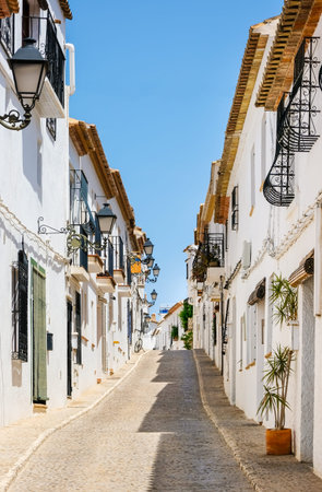 Typical view of Altea old town in Spain. Beautiful village with cobblestoned narrow streets, typical...