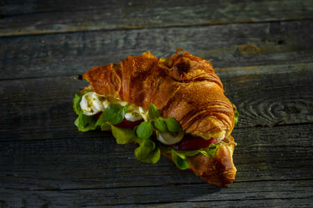 croissant with mozzarella and tomatoesの写真素材