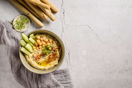 hummus with cucumber and sesame seeds. high quality photoの写真素材