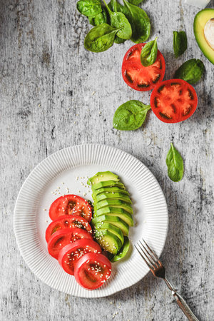 avocado, spinach and tomato salad. high quality photoの写真素材