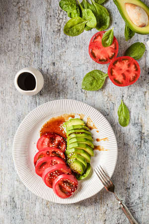 avocado, spinach and tomato salad. high quality photoの写真素材