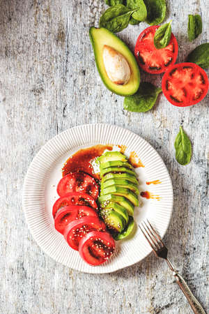 avocado, spinach and tomato salad. high quality photoの写真素材