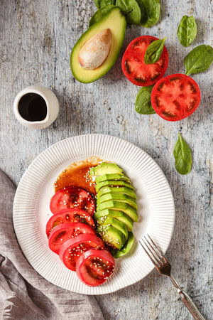 avocado, spinach and tomato salad. high quality photoの写真素材