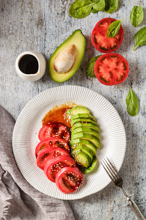 avocado, spinach and tomato salad. high quality photoの写真素材