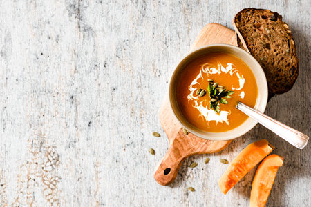 pumpkin soup on a light background. high quality photoの写真素材