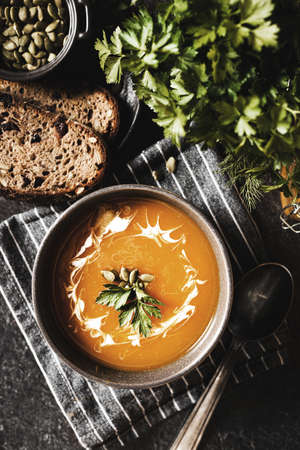 pumpkin soup on a dark background. high quality photoの写真素材