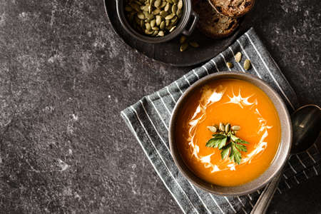 pumpkin soup on a dark background. high quality photoの写真素材