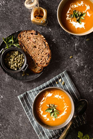 pumpkin soup on a dark background. high quality photoの写真素材