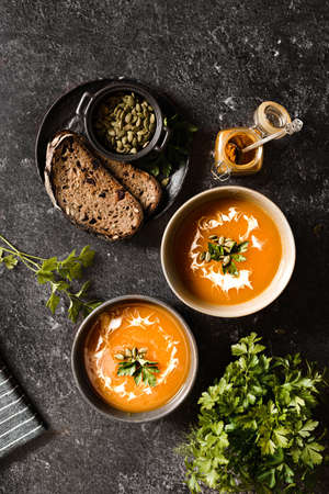 pumpkin soup on a dark background. high quality photoの写真素材