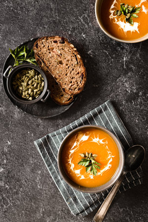 pumpkin soup on a dark background. high quality photoの写真素材
