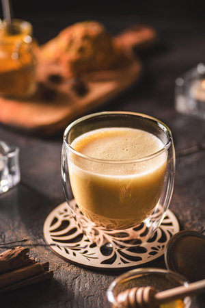 turmeric latte on a dark background. high quality photoの写真素材