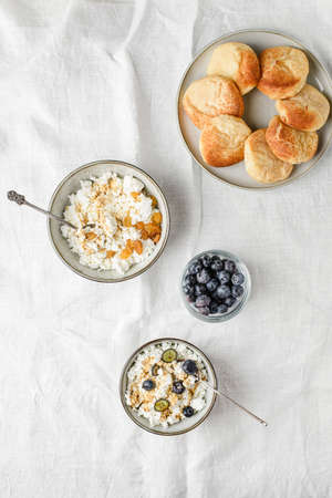 cottage cheese with blueberries and raisins. high quality photoの写真素材