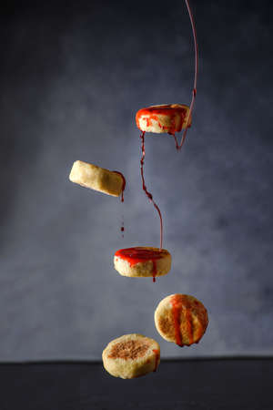 cheesecakes levitation with sauce. high quality photoの写真素材