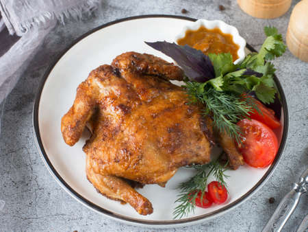 tobacco chicken on a gray background. high quality photoの写真素材