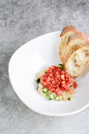 tartar with strawberries and bread. high quality photo