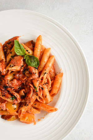 penne pasta in tomato sauceの写真素材