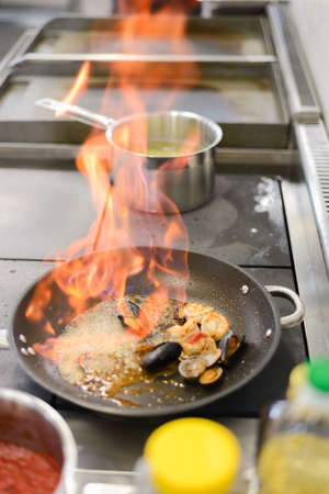 pasta with seafood in the restaurantの写真素材