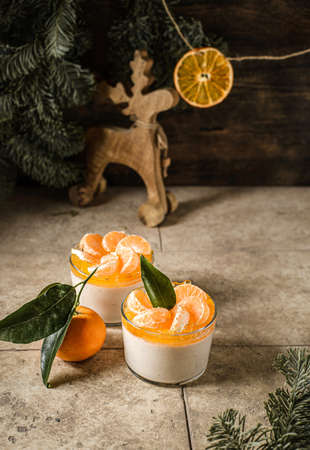 panna cotta with tangerines on the background. high quality photoの写真素材