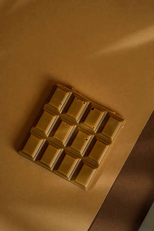 chocolate bar on brown backgroundの写真素材