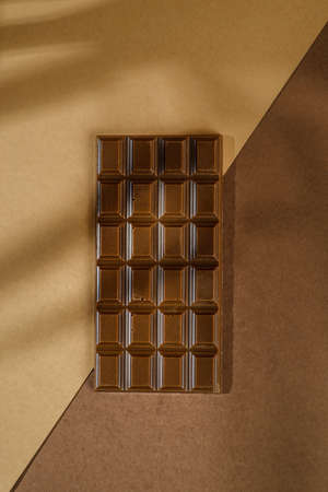 chocolate bar on brown backgroundの写真素材
