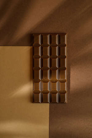 chocolate bar on brown backgroundの写真素材