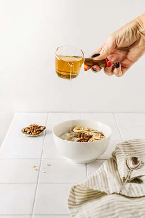 rice porridge with banana and nuts. high quality photoの写真素材