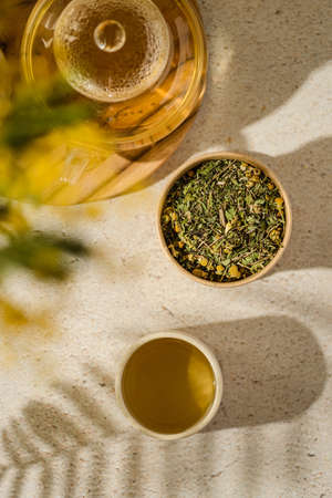 green tea in a tea pot. high quality photoの写真素材