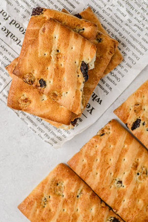 shortbread cookies pattern and stack of cookies with raisins on white background. Biscuit are made from flour and butterの写真素材